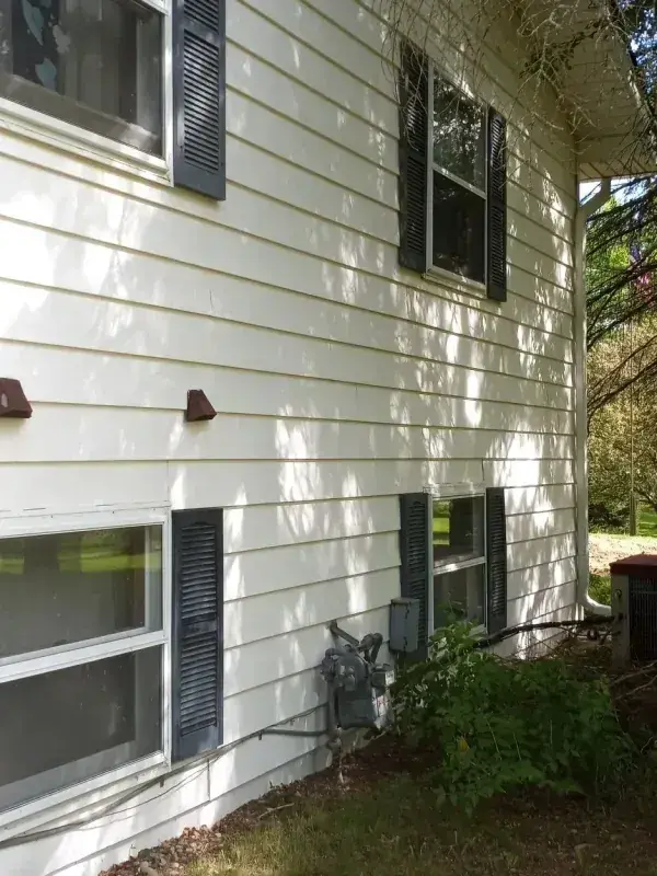 Gutter Cleaning in progress in Whitmore Lake, MI